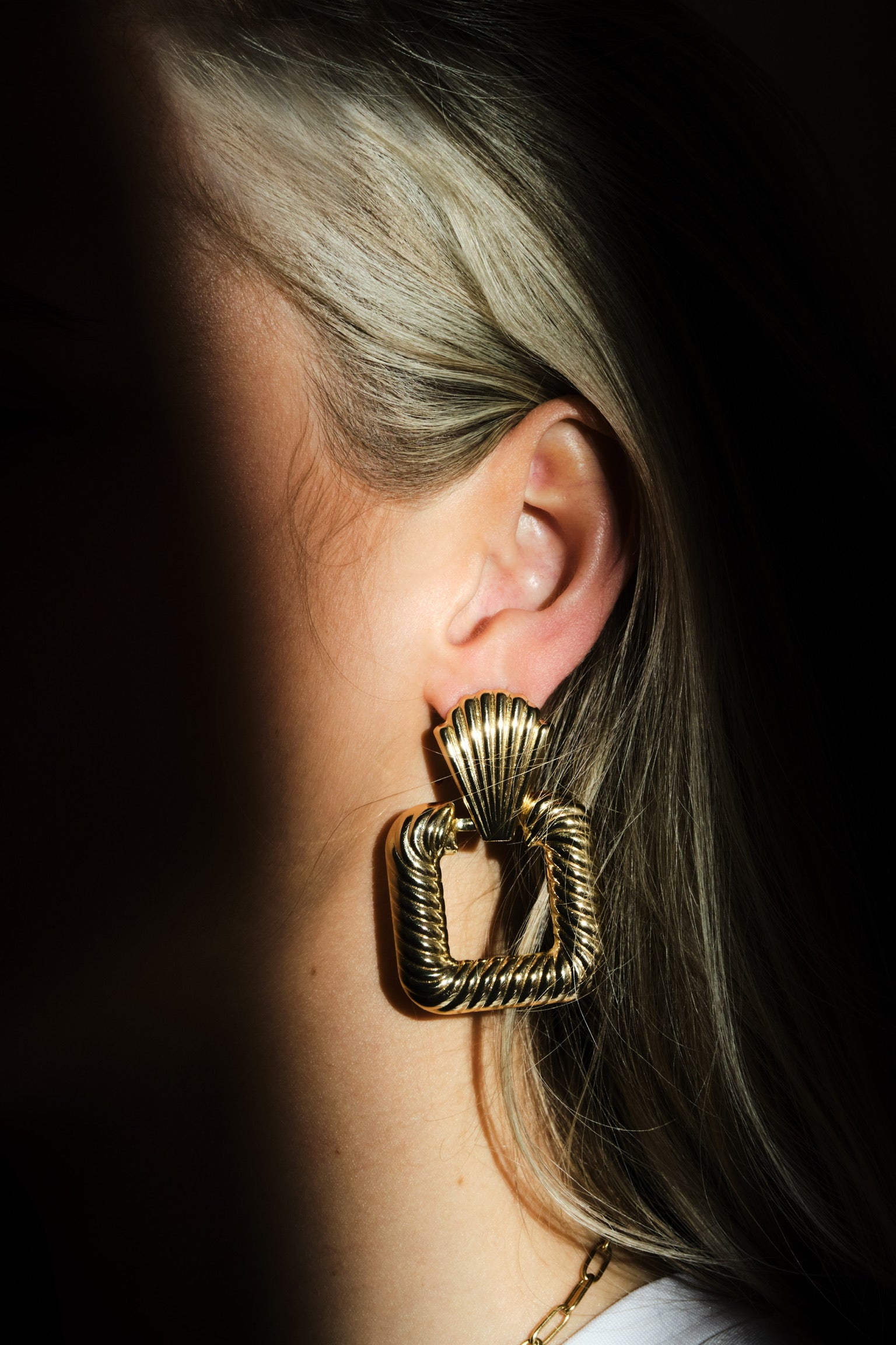 Schelp oorbellen - goud